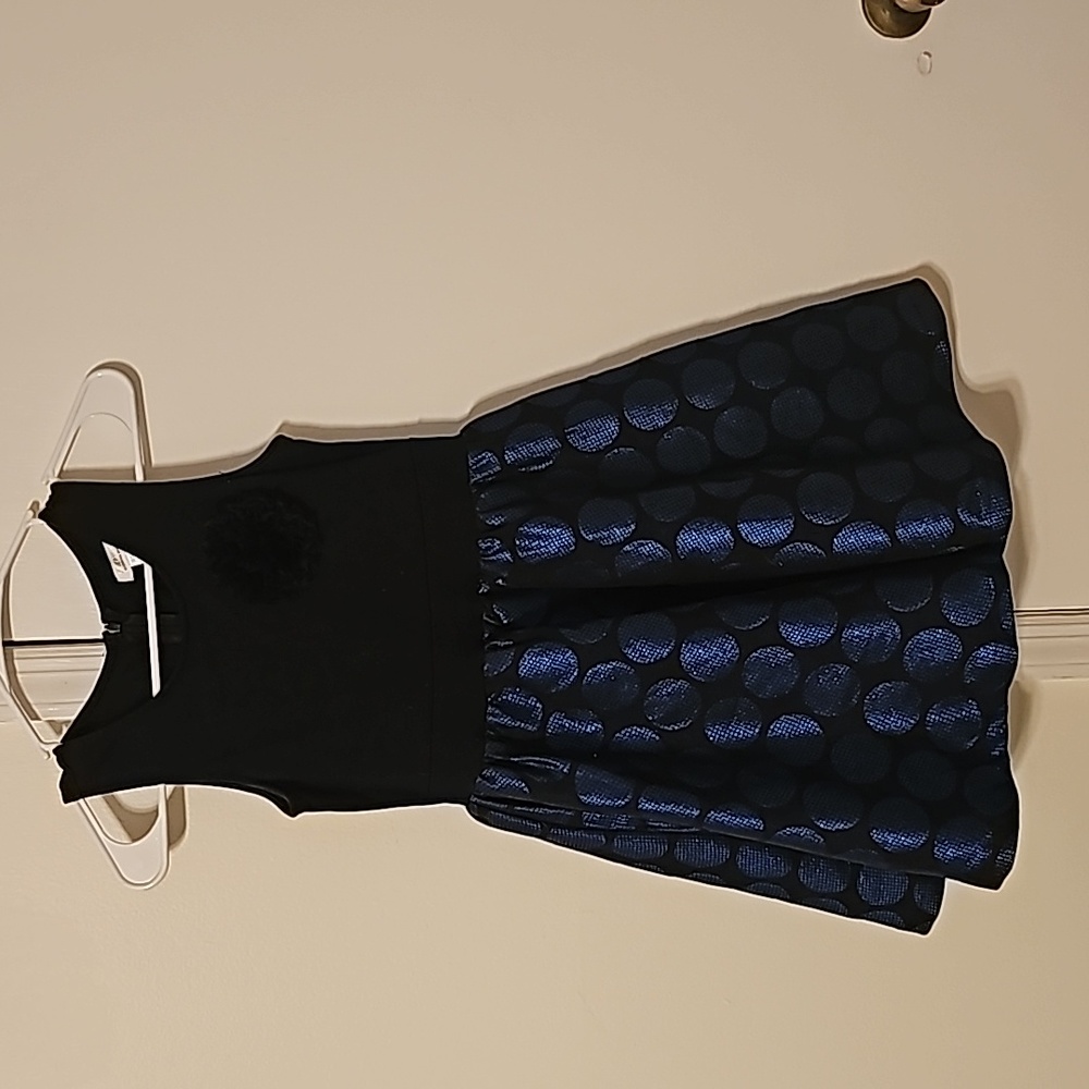 Size 10 sleeveless, blue w black underskirt, black lace, blue design skirt